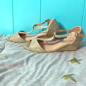 Girls expensive gold shoe